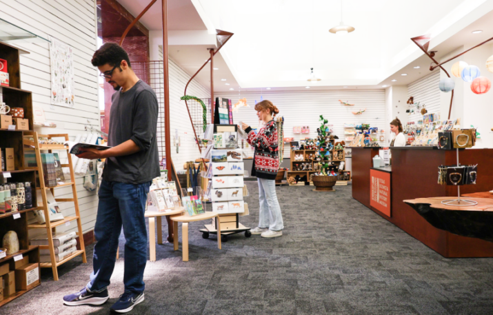 Patrons browse the museum gift shop