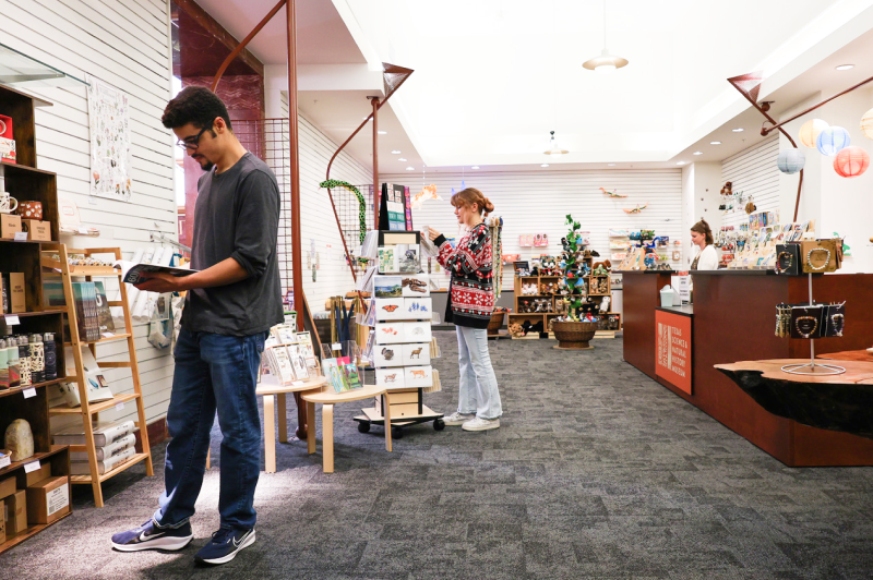 Patrons browse the museum gift shop