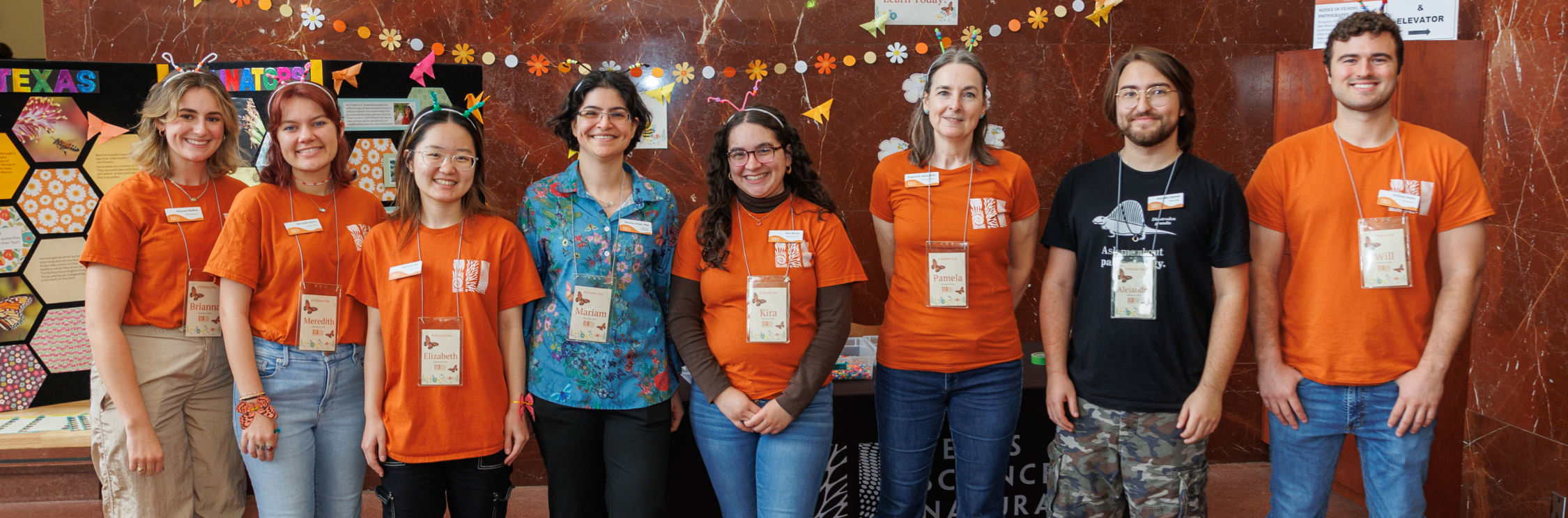 Volunteers line up for a photo